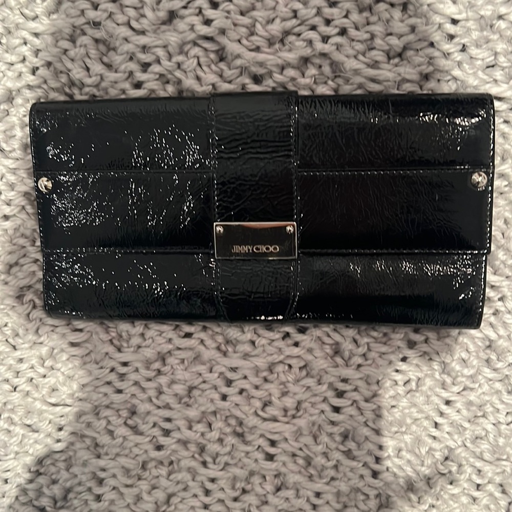 Jimmy Choo patent leather black clutch! Muted gold hardware